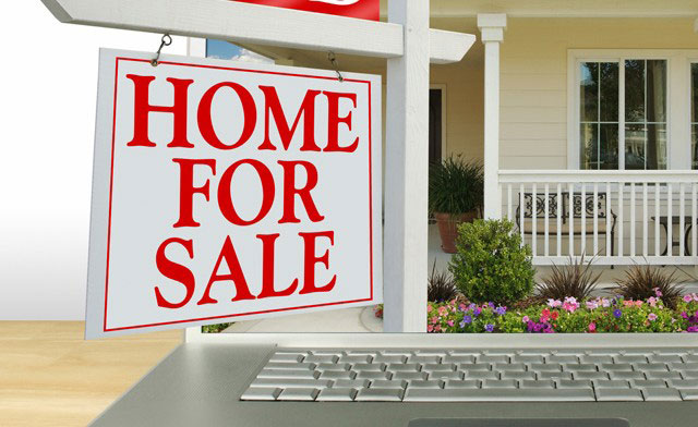 kuća i natpis "home for sale"